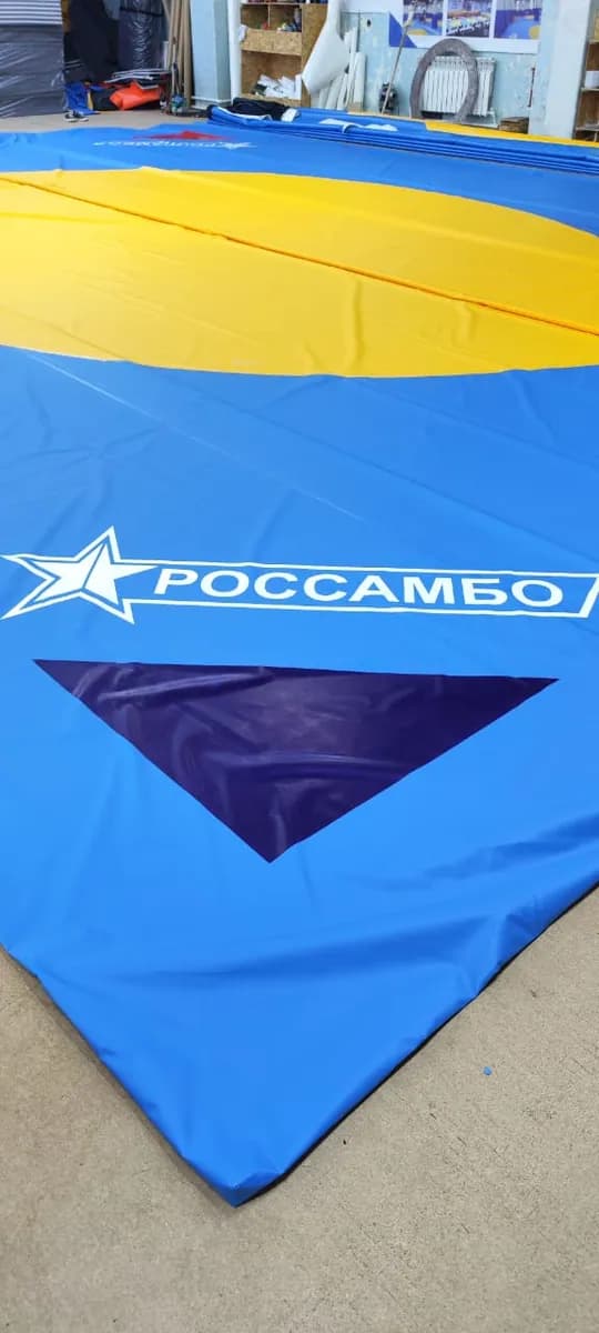 Нанесение логотипа на покрытие РОССАМБО