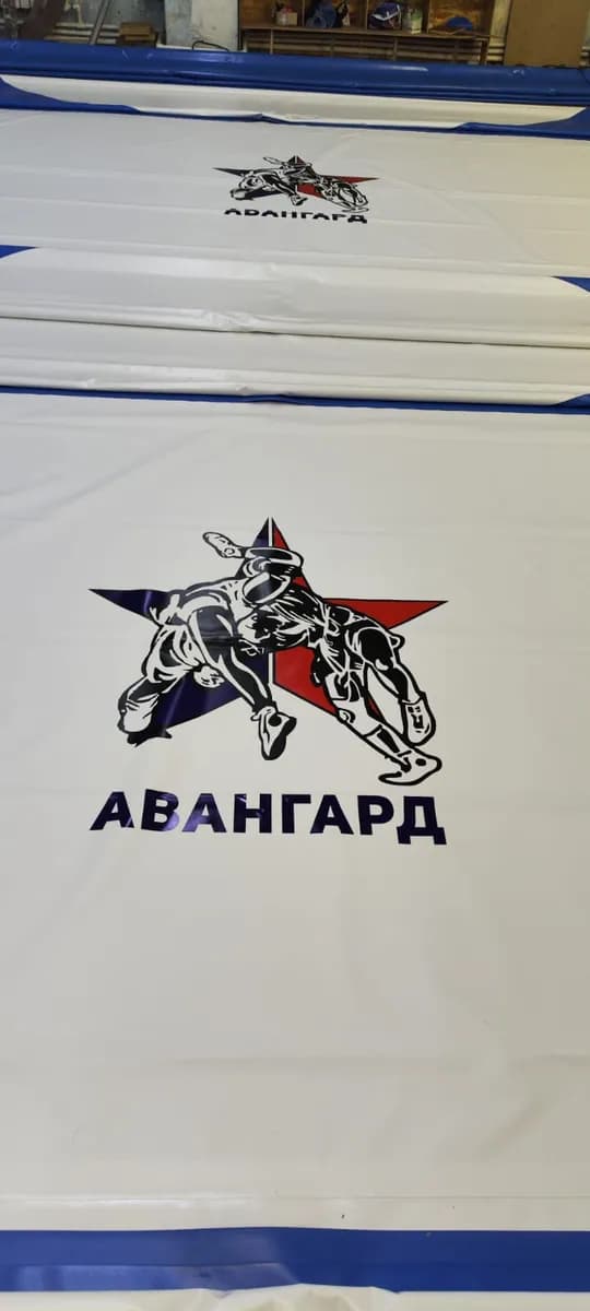 Нанесение логотипа на покрытие РОССАМБО
